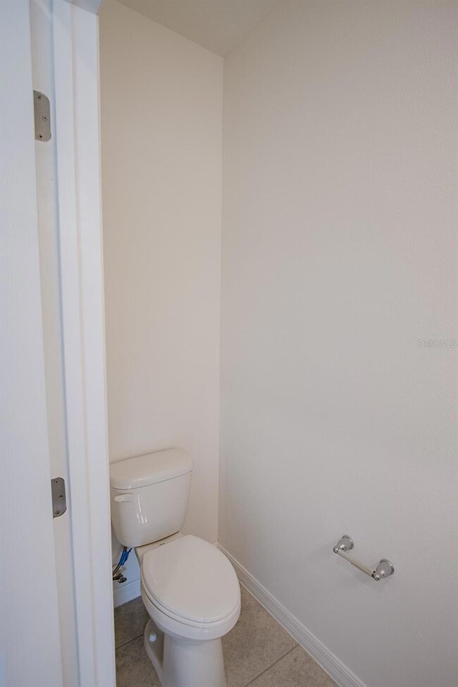 Interior photos are of a different property of the same model.  This house has similar finishings.