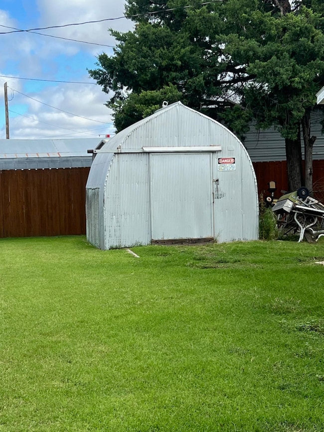 210 Benton St, Jetmore, KS 67854 - photo 6