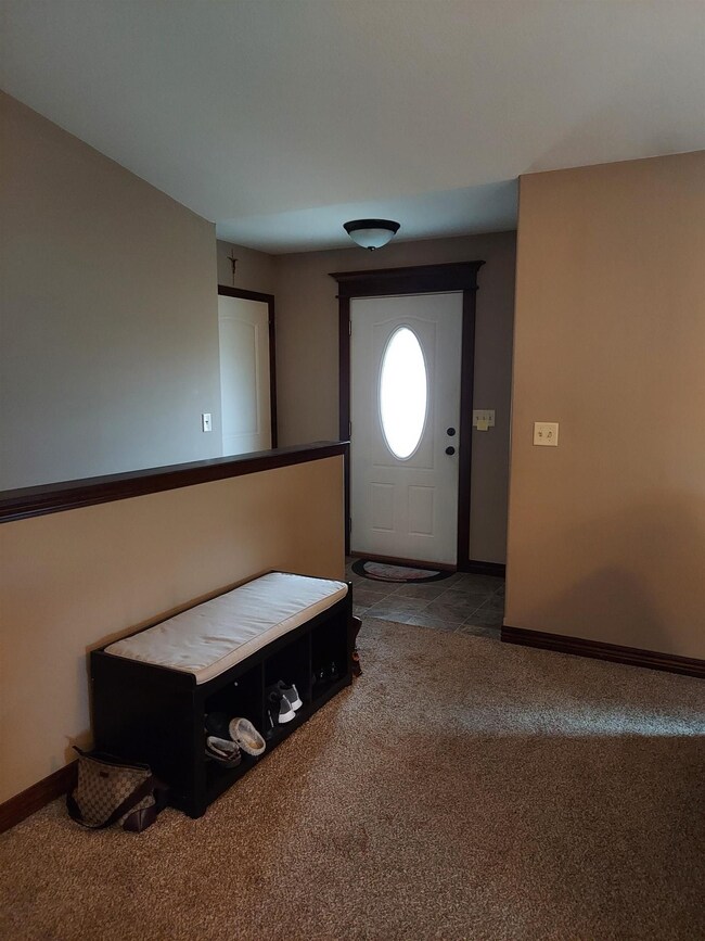 Newer front door & tile entry