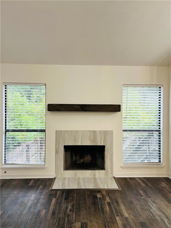Gorgeous wood burning fireplace with tons of natur