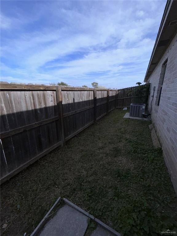 View of fenced backyard
