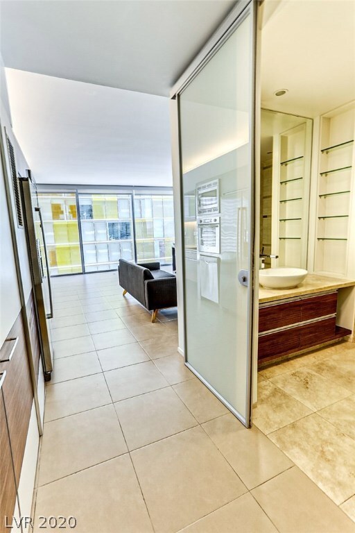 Enter unit into Hallway with Shower Bath to the ri