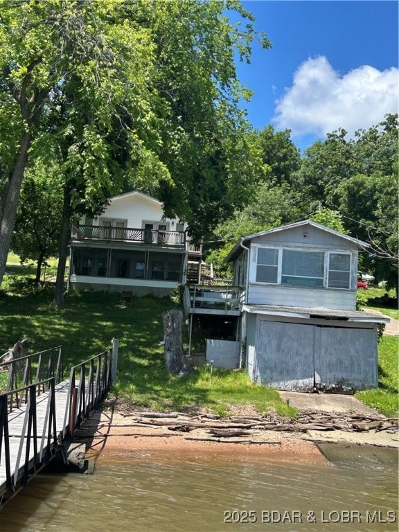 View from dock showing boathouse/apartment and mai
