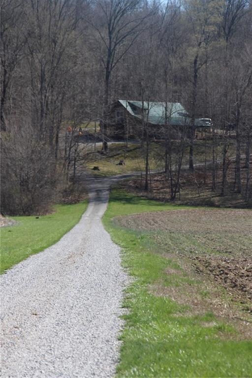 The drive way land is 30ft wide. Its isn't an easement. 