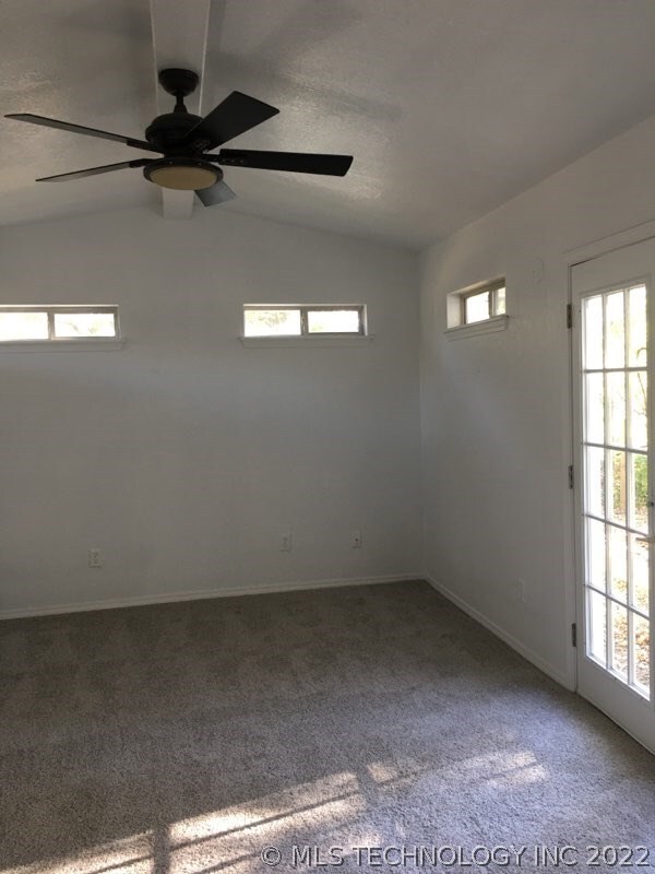 Master bedroom with french doors leading to back d