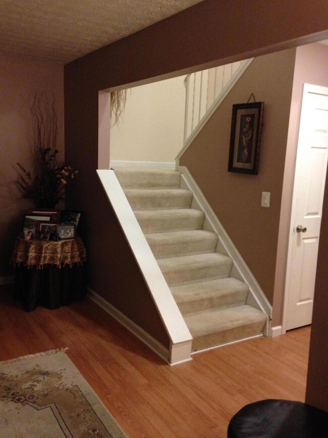 Stairs from entry level to upstairs
