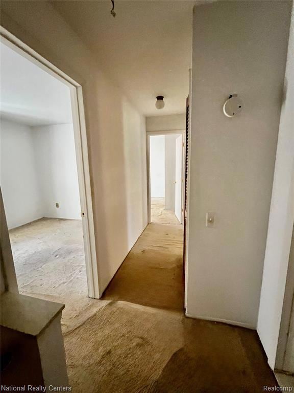 Hall featuring carpet