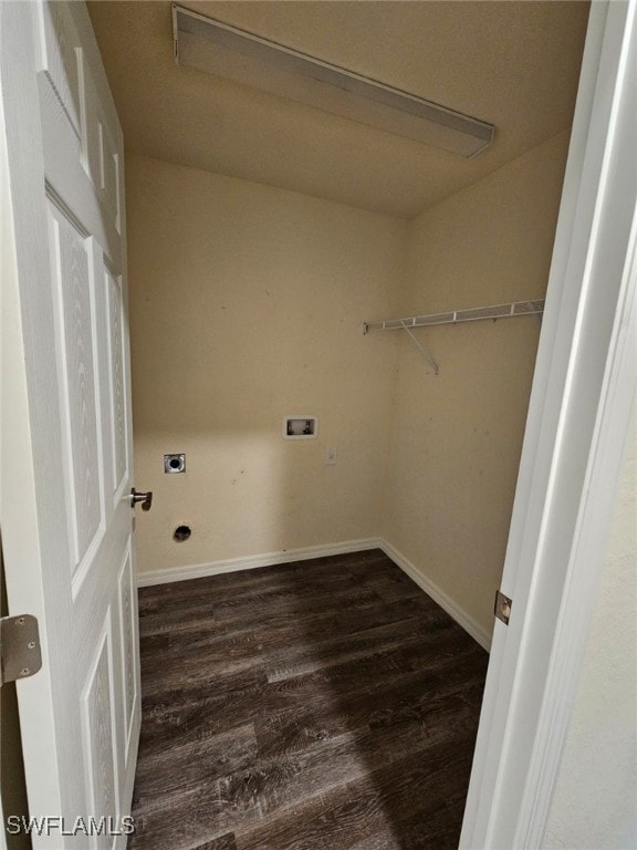 Laundry room featuring electric dryer hookup, hookup for a washing machine, and dark wood-style floors