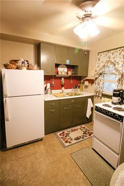 Kitchen with ceiling fan and window!