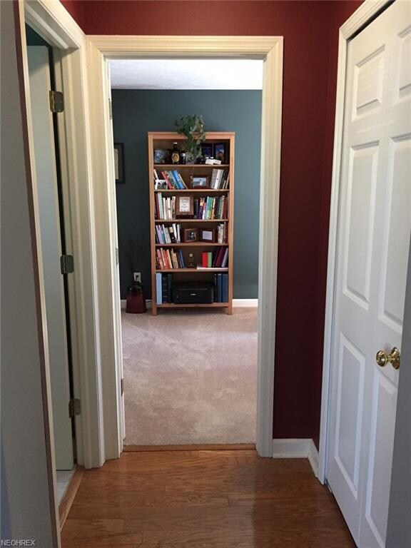 The front entry hall leads to a half bath, first f