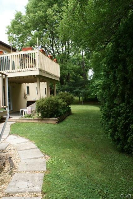 part of backyard with deck area
