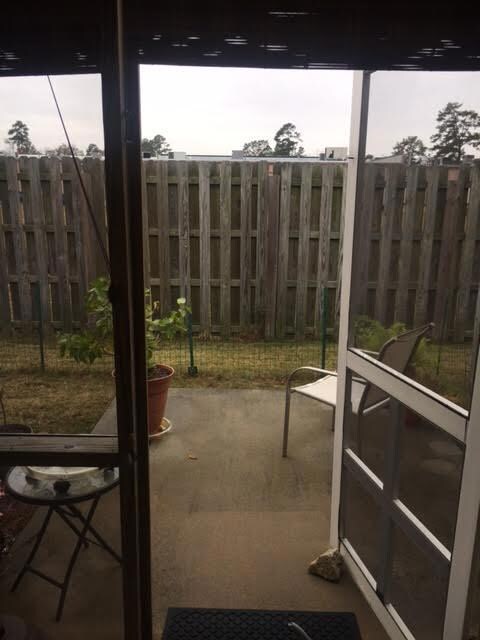 screened porch looking onto patio