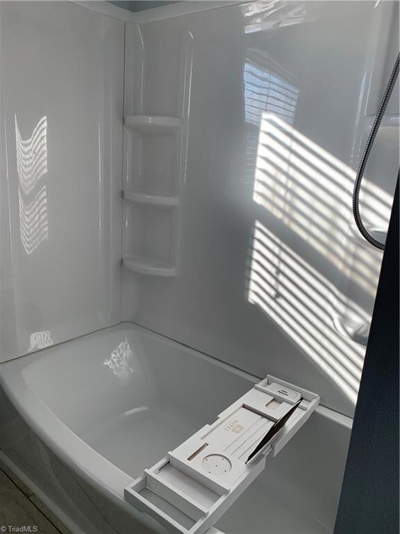 Escape your busy day in this spacious bathtub