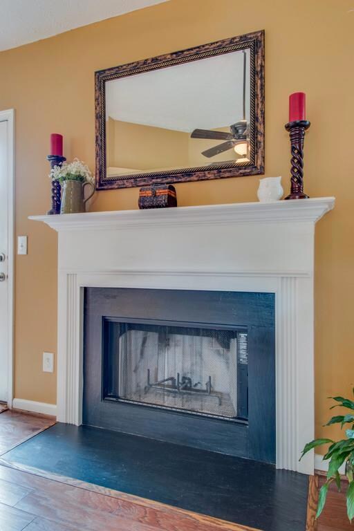 Stay warm through the winter beside this wood burning fireplace in the living room!