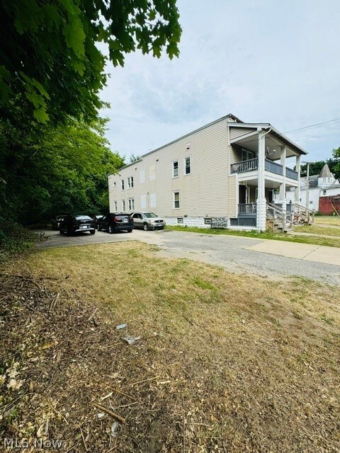 Side view of property , showing driveway.