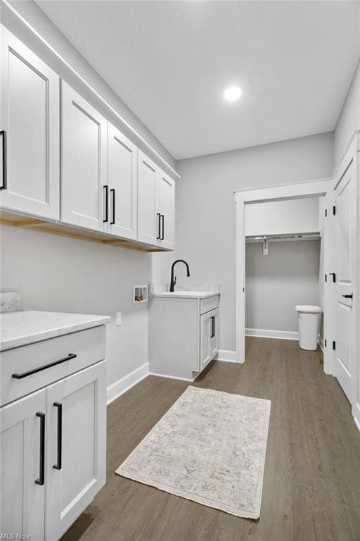 Laundry room with 2 large storage closets.
