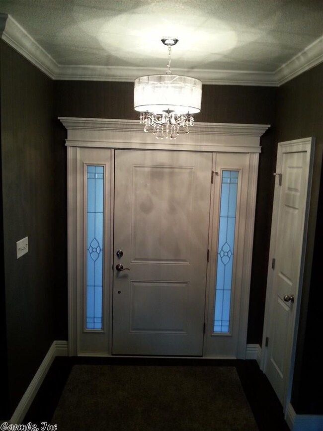Foyer with hall closet.