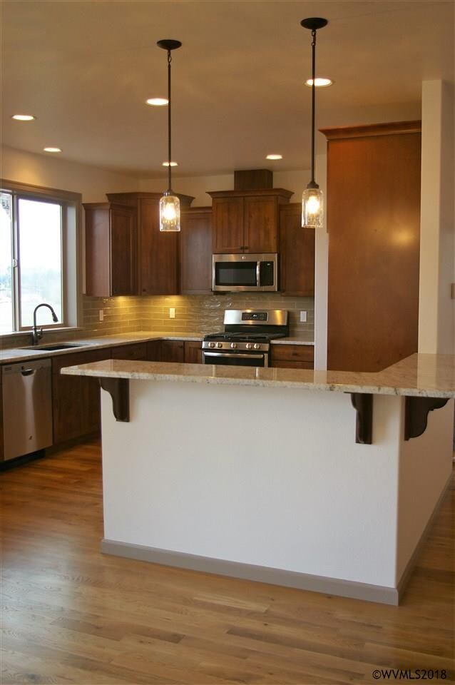Spacious kitchen with generous counter space.