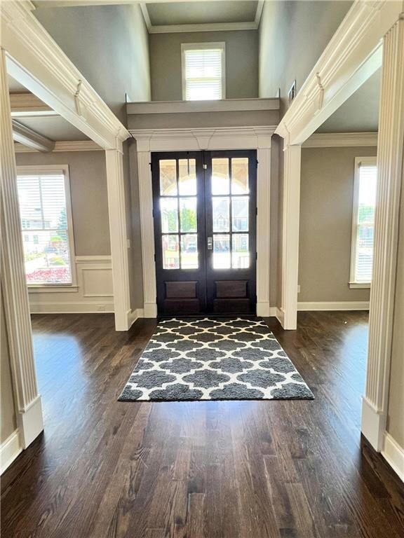 Foyer entrance featuring french doors, ornamental 