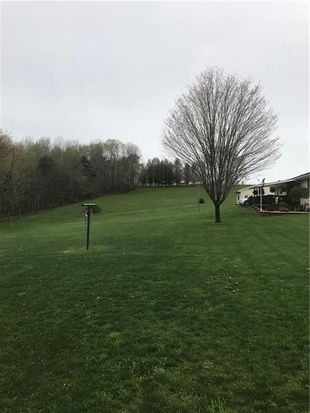 Large Back Yard Surrounded by Woods