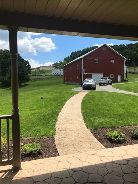 The front porch is just a few steps to the barn an