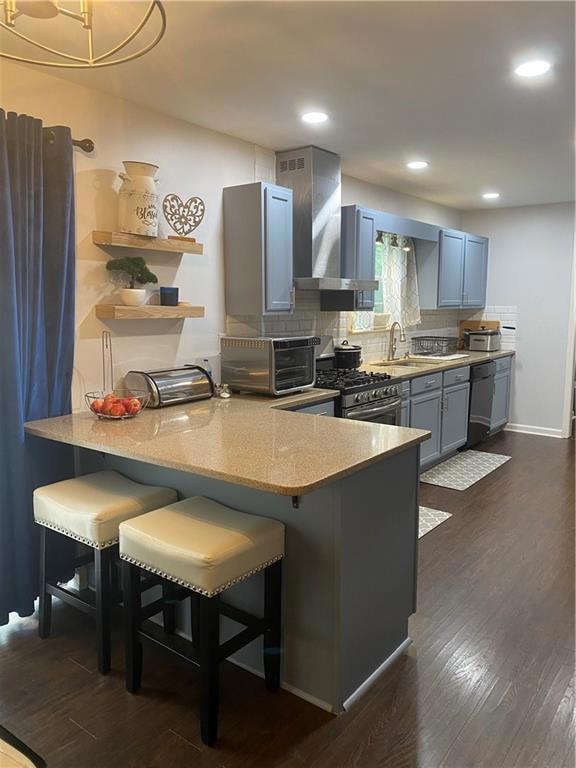 Kitchen with ventilation hood, stove, dark wood-st