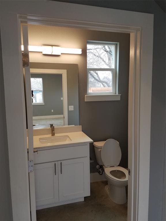 Bathroom featuring toilet and vanity