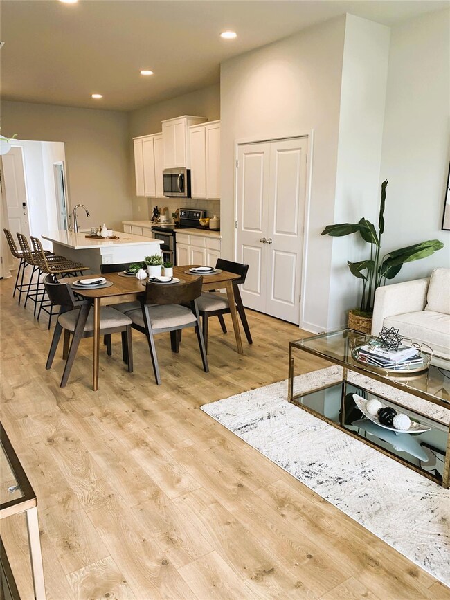Kitchen featuring appliances with stainless steel