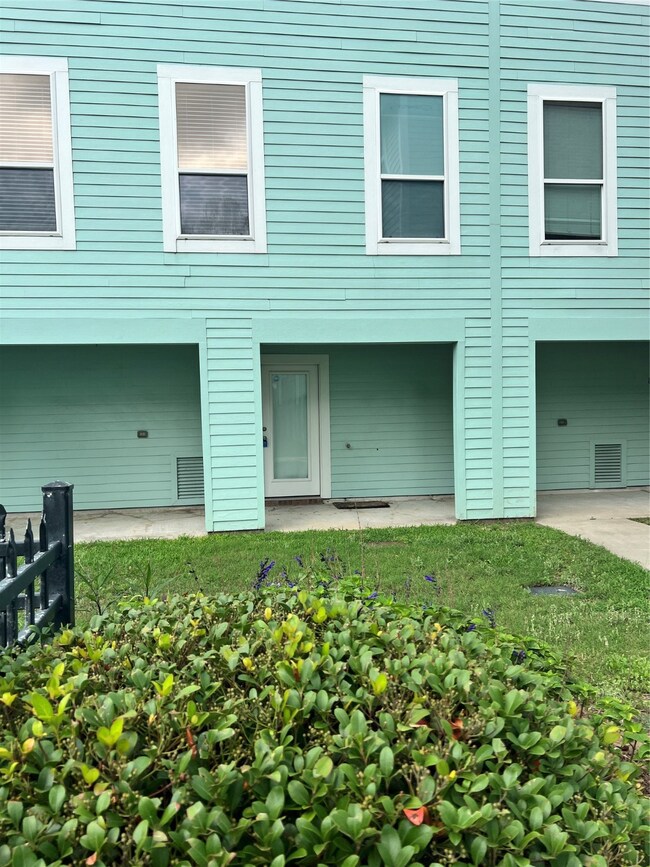 With a light teal exterior, featuring two upper wi