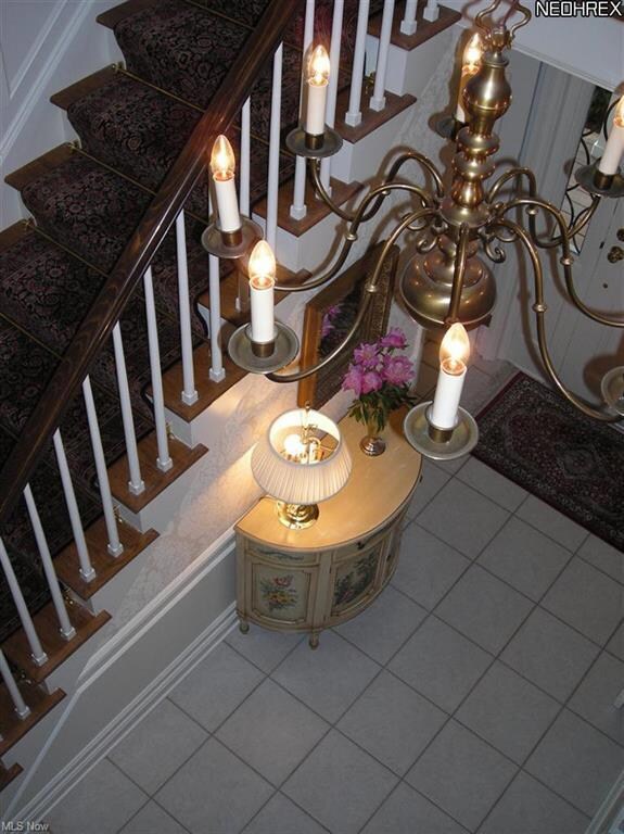 The two story entryway is elegant.