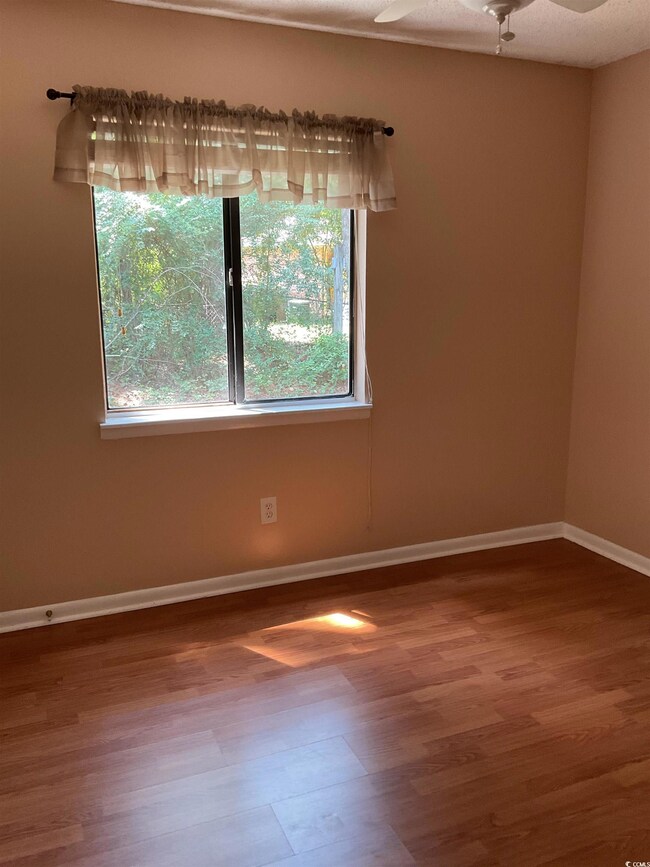 Other bedroom with plenty of natural light, wood-t