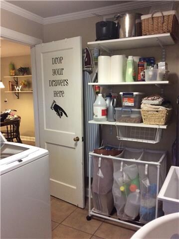 Great size laundry room with a sink.
