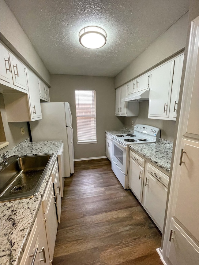 Recently updated kitchen includes new countertops,