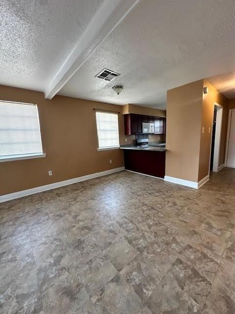 Living room looking into breakfast area