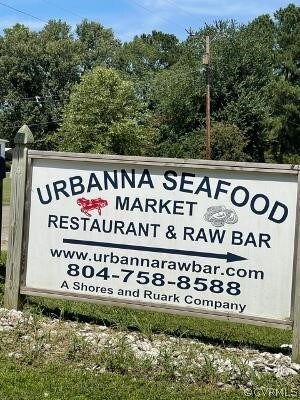 LAND IS 1/2 PAST THE URBANNA SEAFOOD MARKET