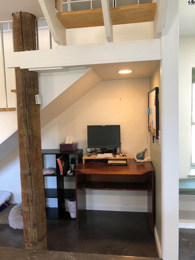Nestled under the open staircase, this has been th