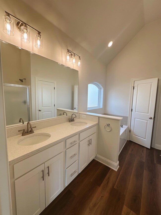 Bathroom featuring hardwood / wood-style flooring,