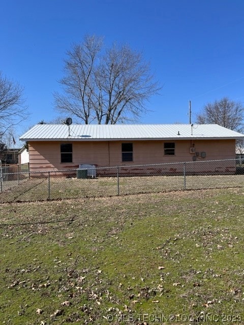 Back Side with fenced in yard