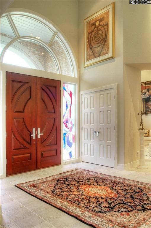 Enter through the custom mahogany double doors int