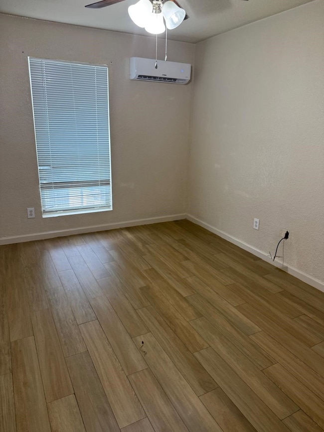 Both bedrooms feature a clean, modern look with wo