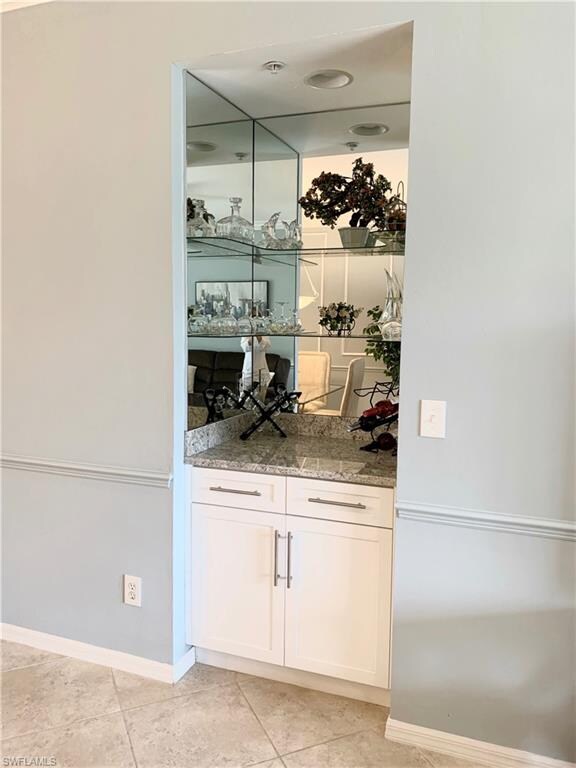 Built in bar with granite counter top and new cabi