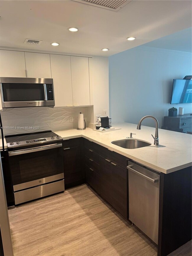 2889 Mcfarlane Rd unit 1406, Miami, FL 33133 - photo 6