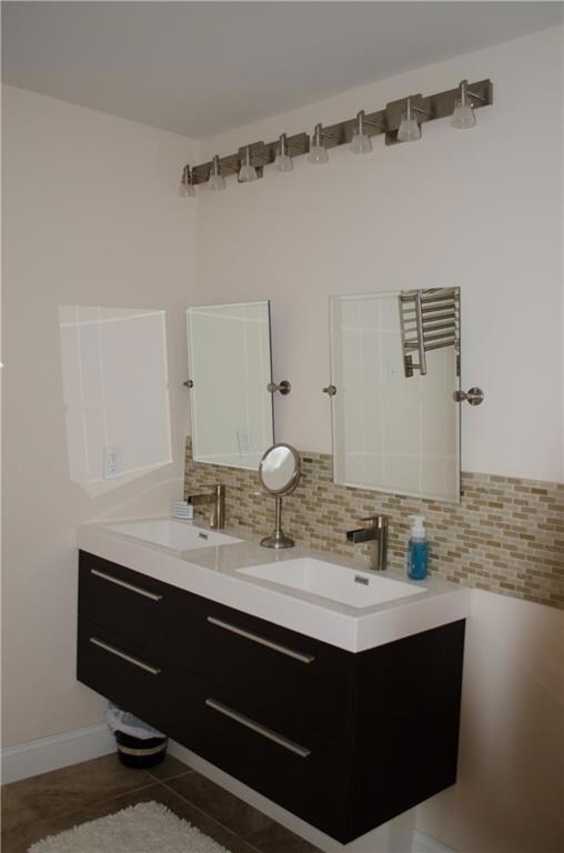 Hall bath with nice tile, floating...