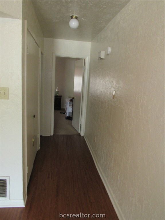 Hallway to downstairs bedroom