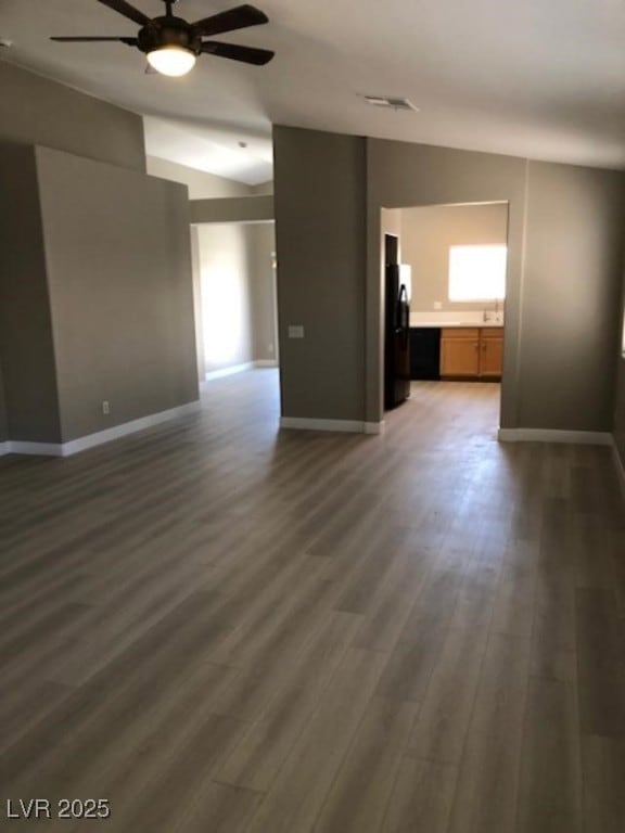 Living room with ceiling fan, vinyl plank flooring