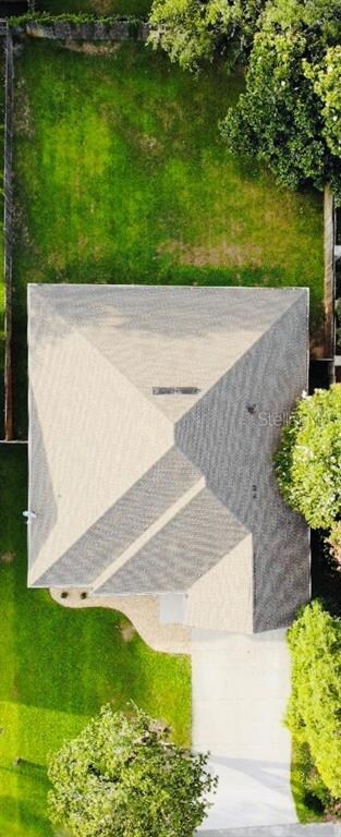 ARIEL VIEW SHOWING EXTENSIVE FENCED BACK YARD AND FRONT OF PROPERTY