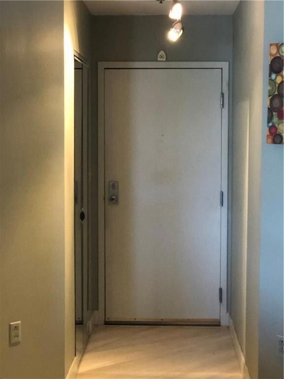 Inviting entrance, with a large closet.