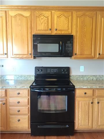 Matching appliances. Smooth top range with built in microwave. 