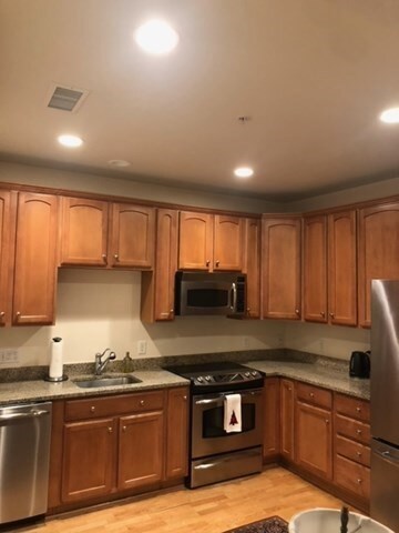 Wellington Crossing unit 308, Waltham, MA 02452 - photo 2