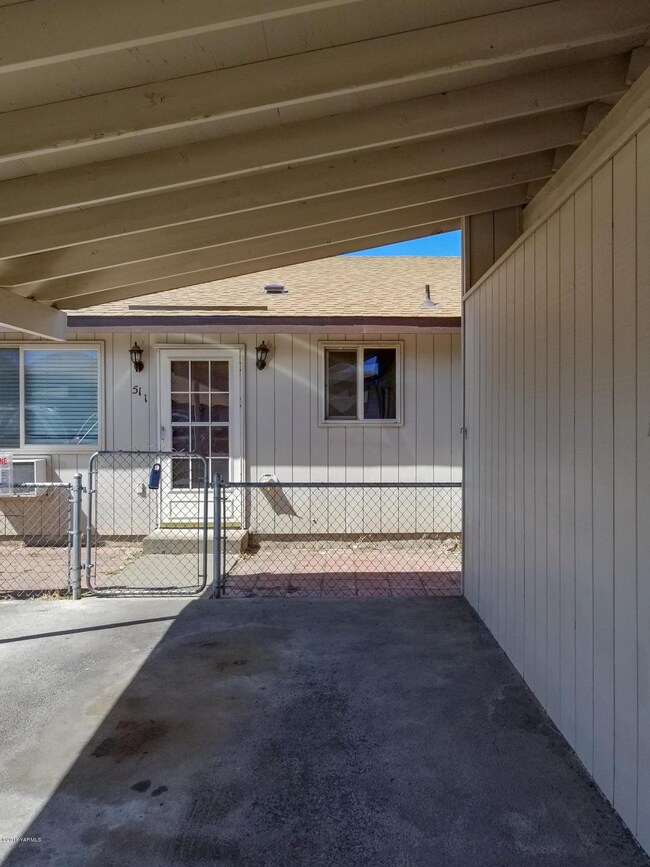 Carport leading to Front Entrance
